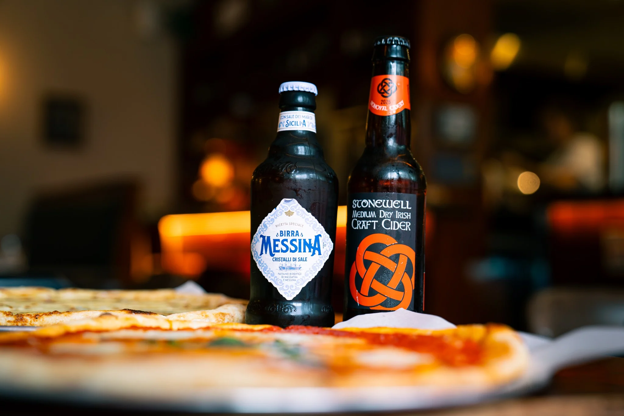 Italian beer and Irish craft cider served with pizza at Billy’s Pizza
