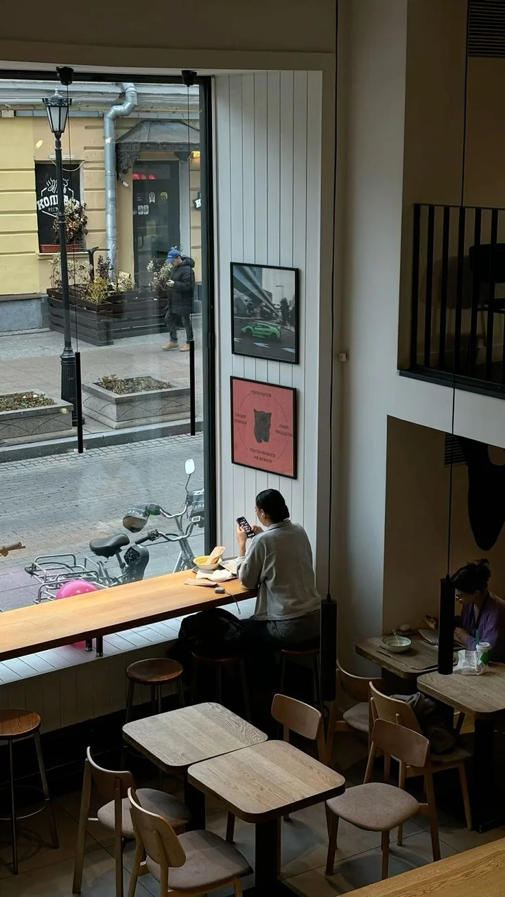 Quiet café interior with street view and window seating