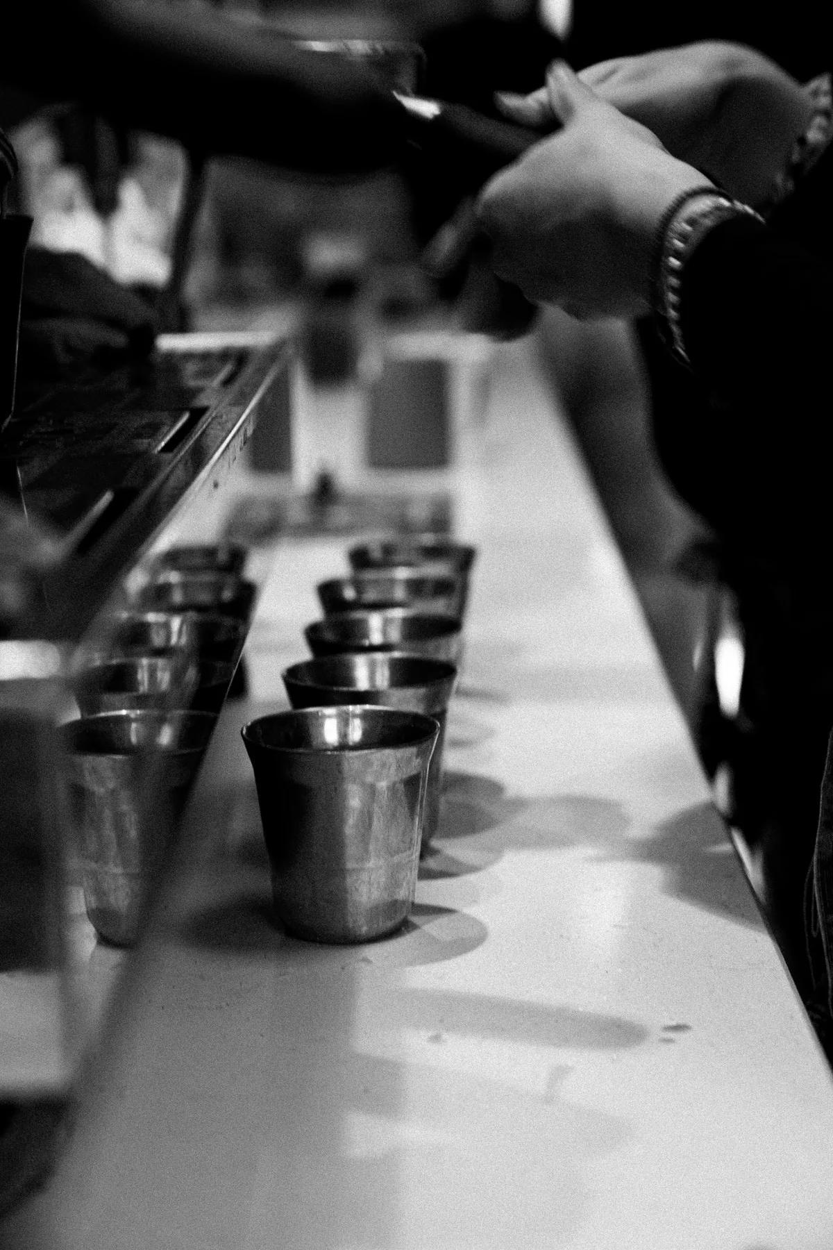 Black and white detail of coffee preparation at Jimmys