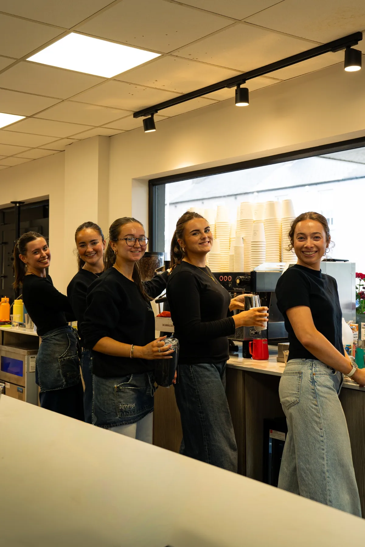 Jimmys Ballina team portrait behind the coffee bar