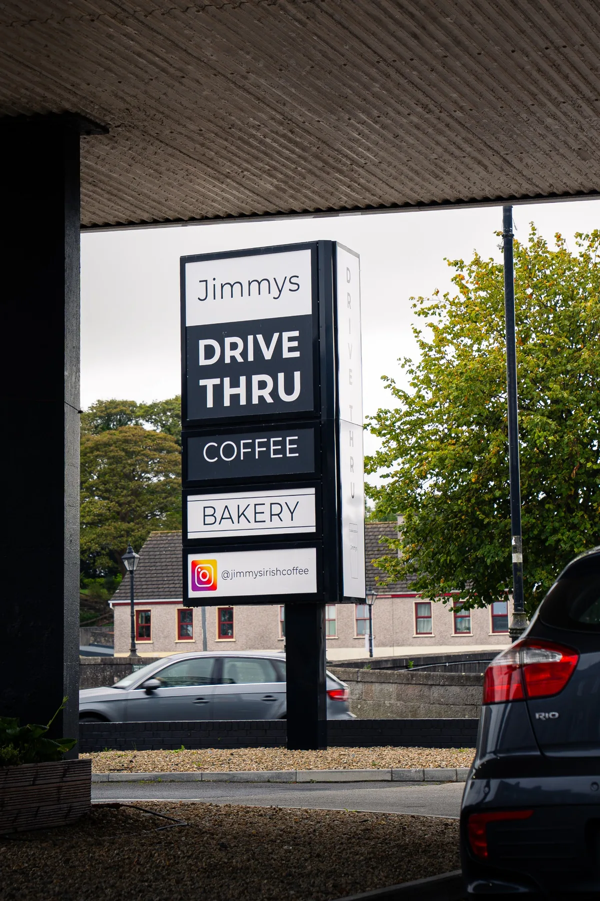 Jimmys Drive Thru coffee and bakery roadside sign