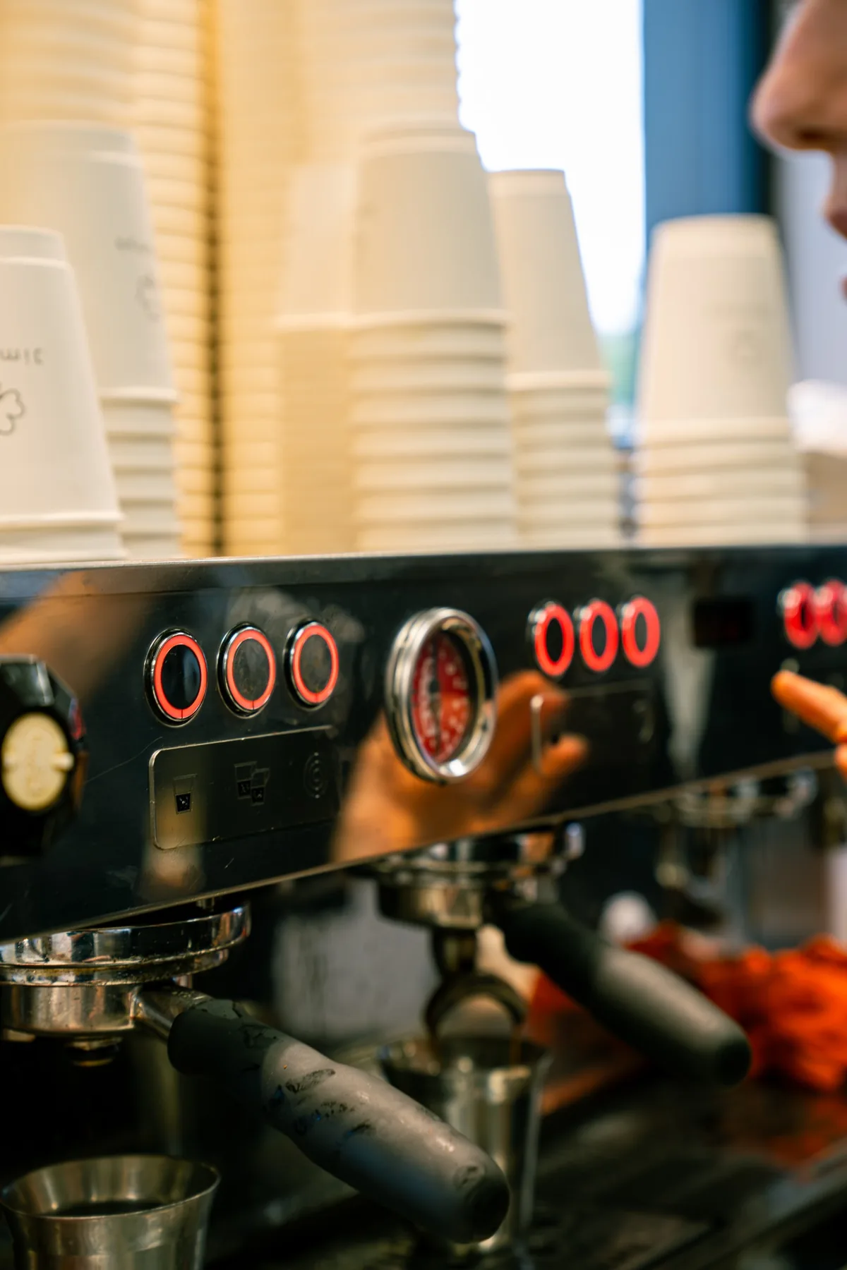 Espresso machine details and stacked Jimmys cups