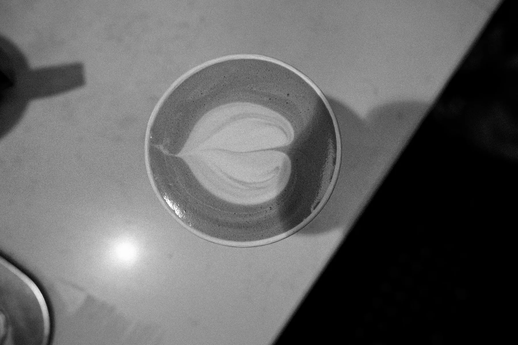 Black and white top view of latte art at Jimmys